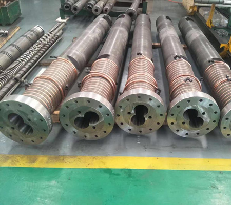 barrels for counter-rotating twin-screw extruders